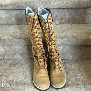 Timberland tall lace up boots new without tags. Size 8 1/2 medium.